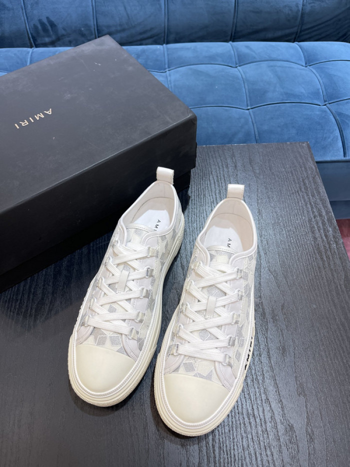 amiri* appliquéd leather and canvas sneakers